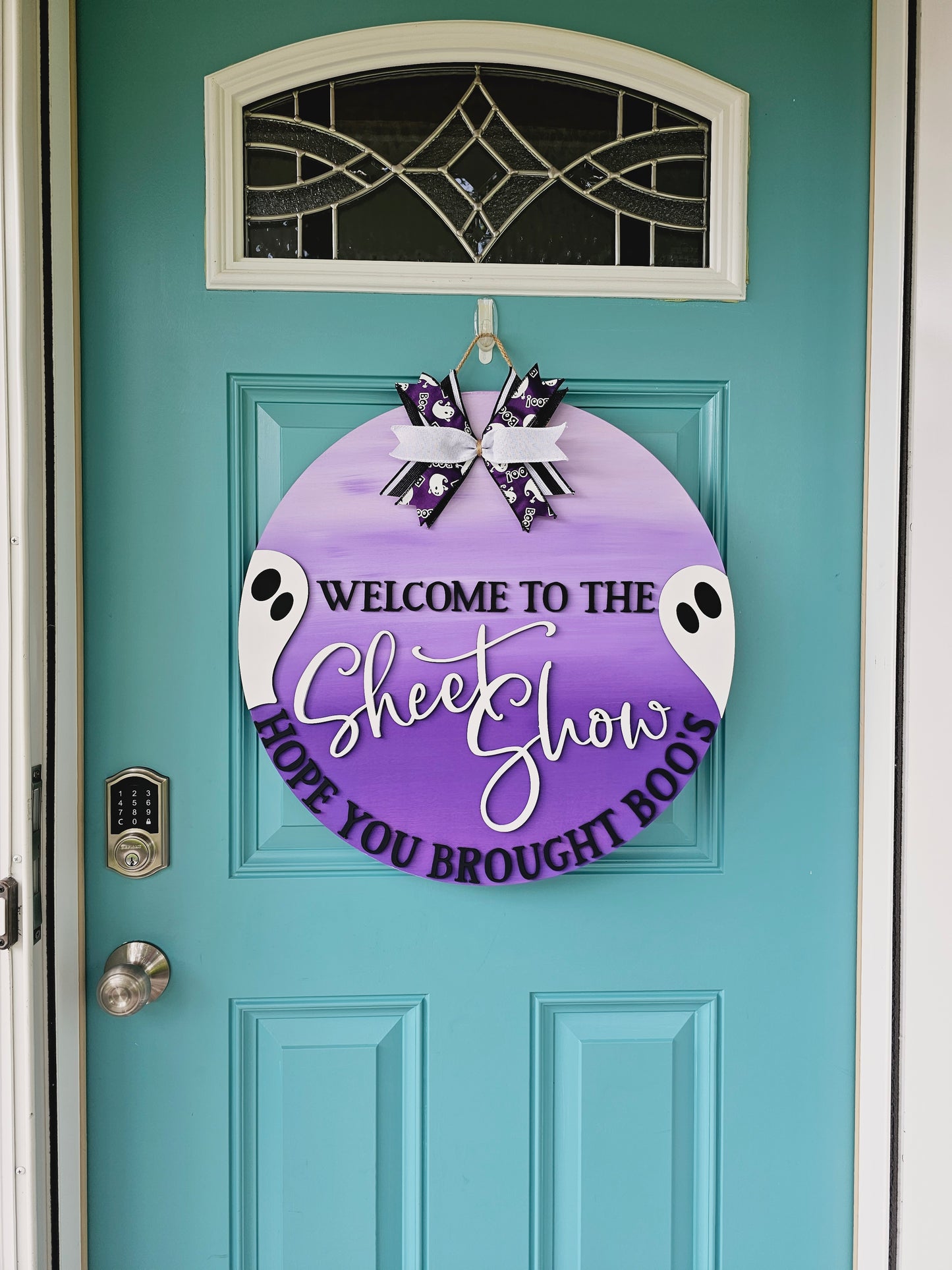 Welcome to the sheetshow Hope you brought boo's Door Hanger