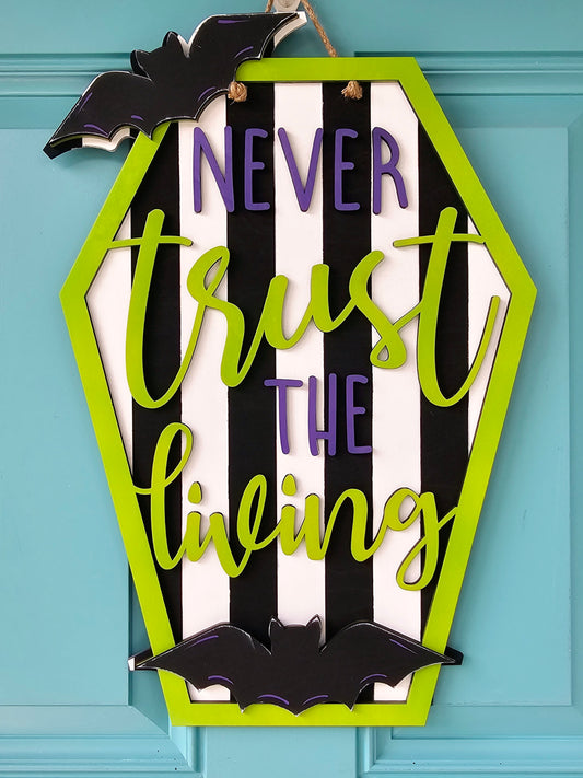 Never Trust the Living Door Hanger