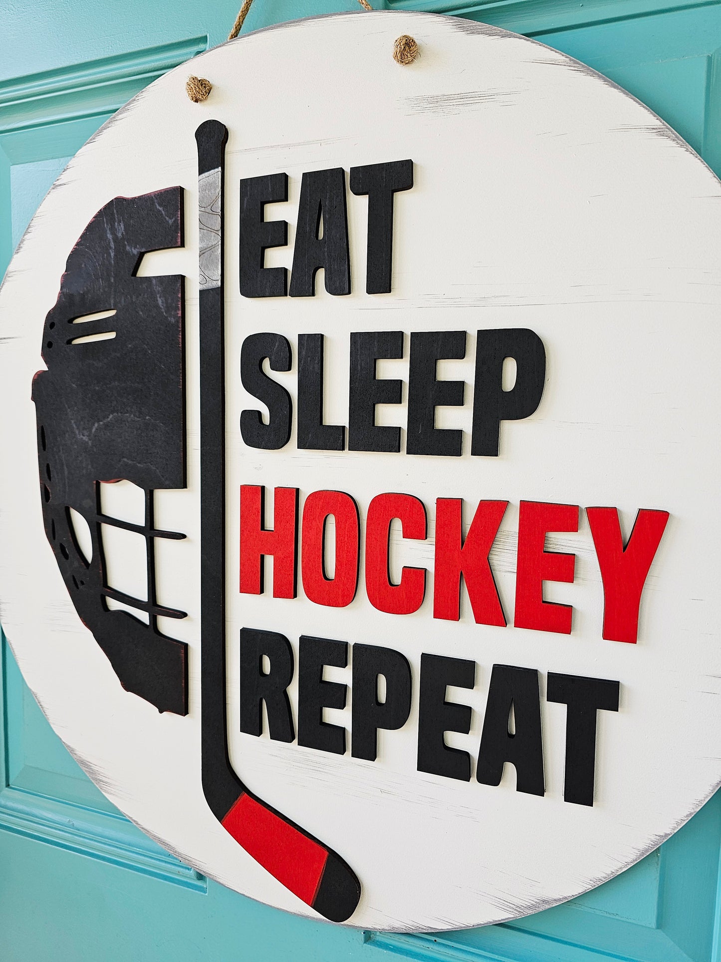 Eat Sleep Hockey Repeat Door Hanger