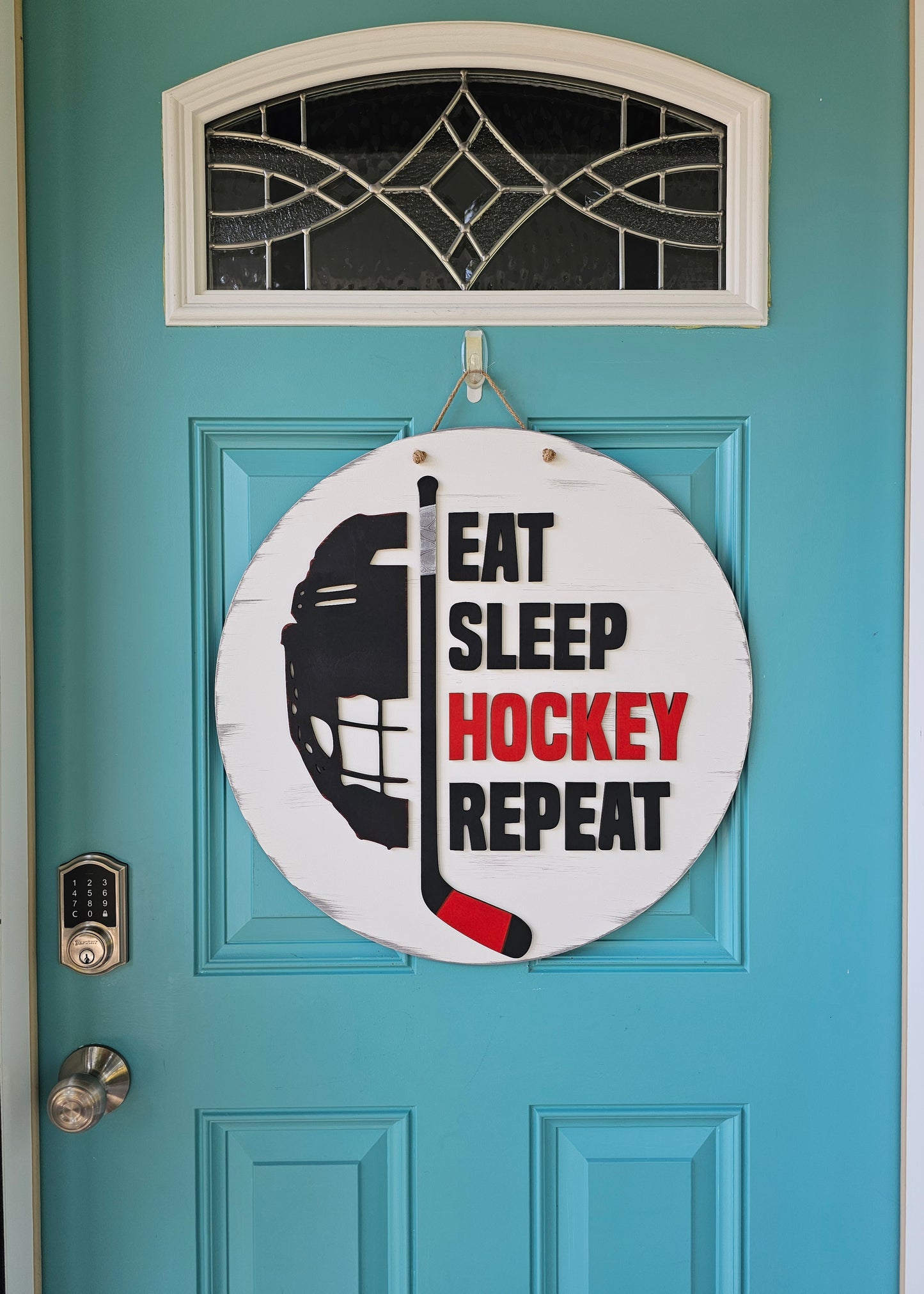 Eat Sleep Hockey Repeat Door Hanger