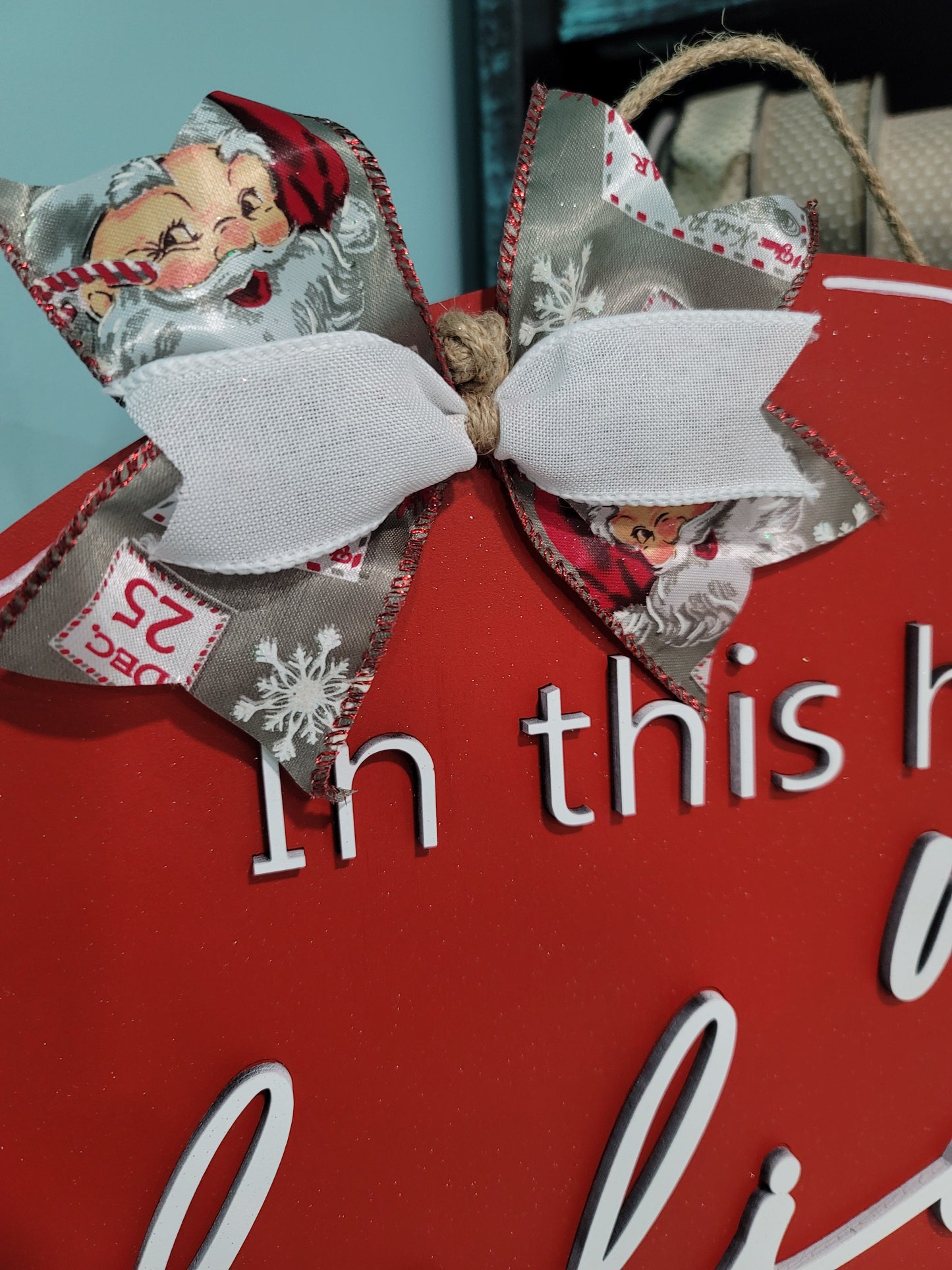 In this house we believe in Santa Door Hanger