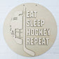Eat Sleep Hockey Repeat Door Hanger