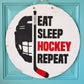 Eat Sleep Hockey Repeat Door Hanger