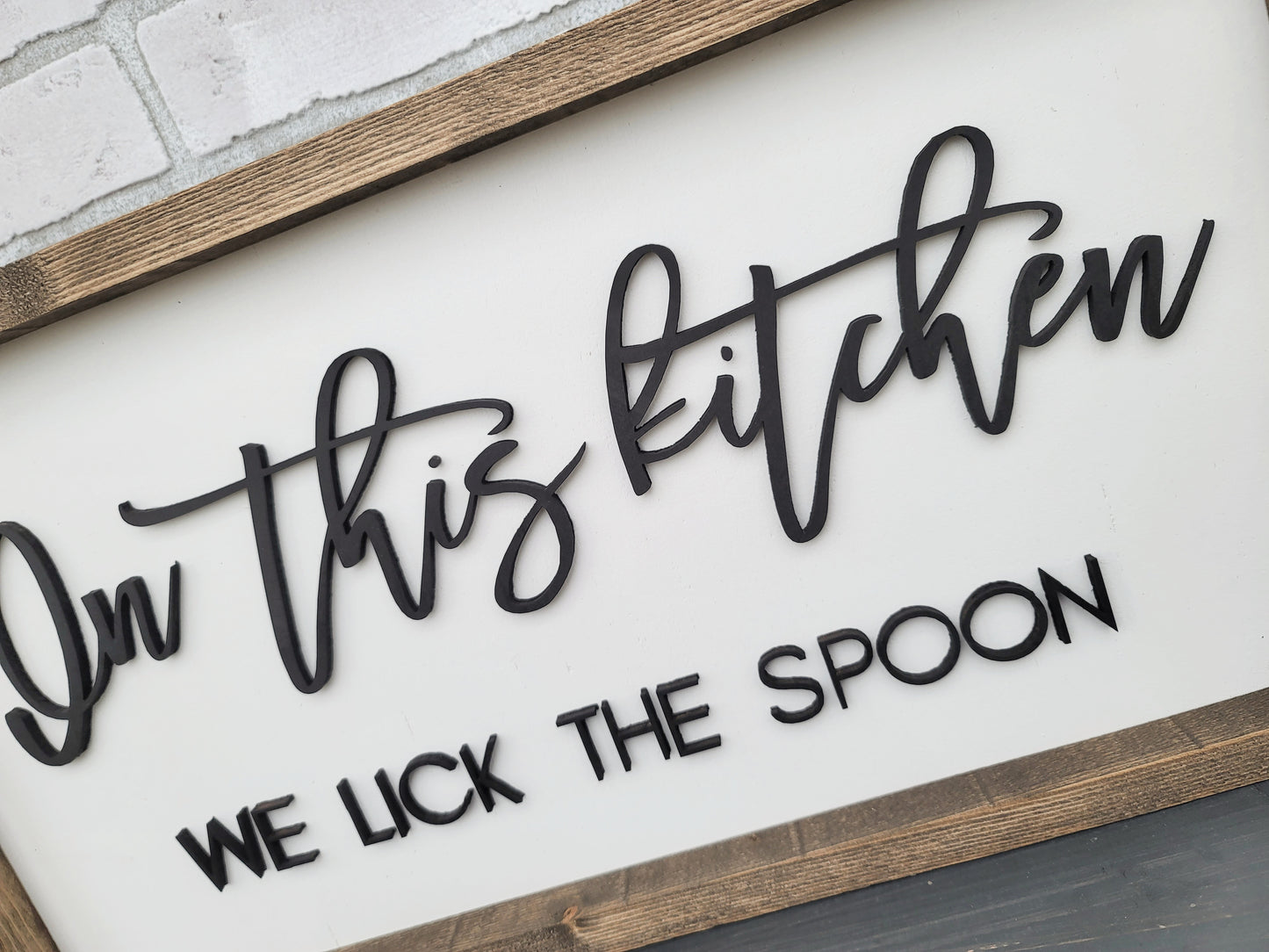 In This Kitchen We Lick The Spoon