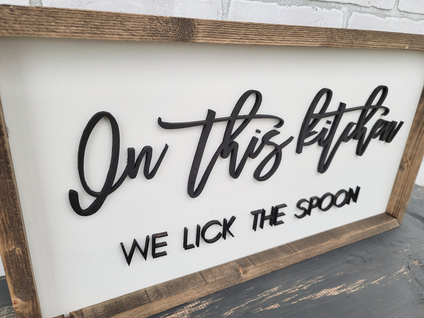 In This Kitchen We Lick The Spoon