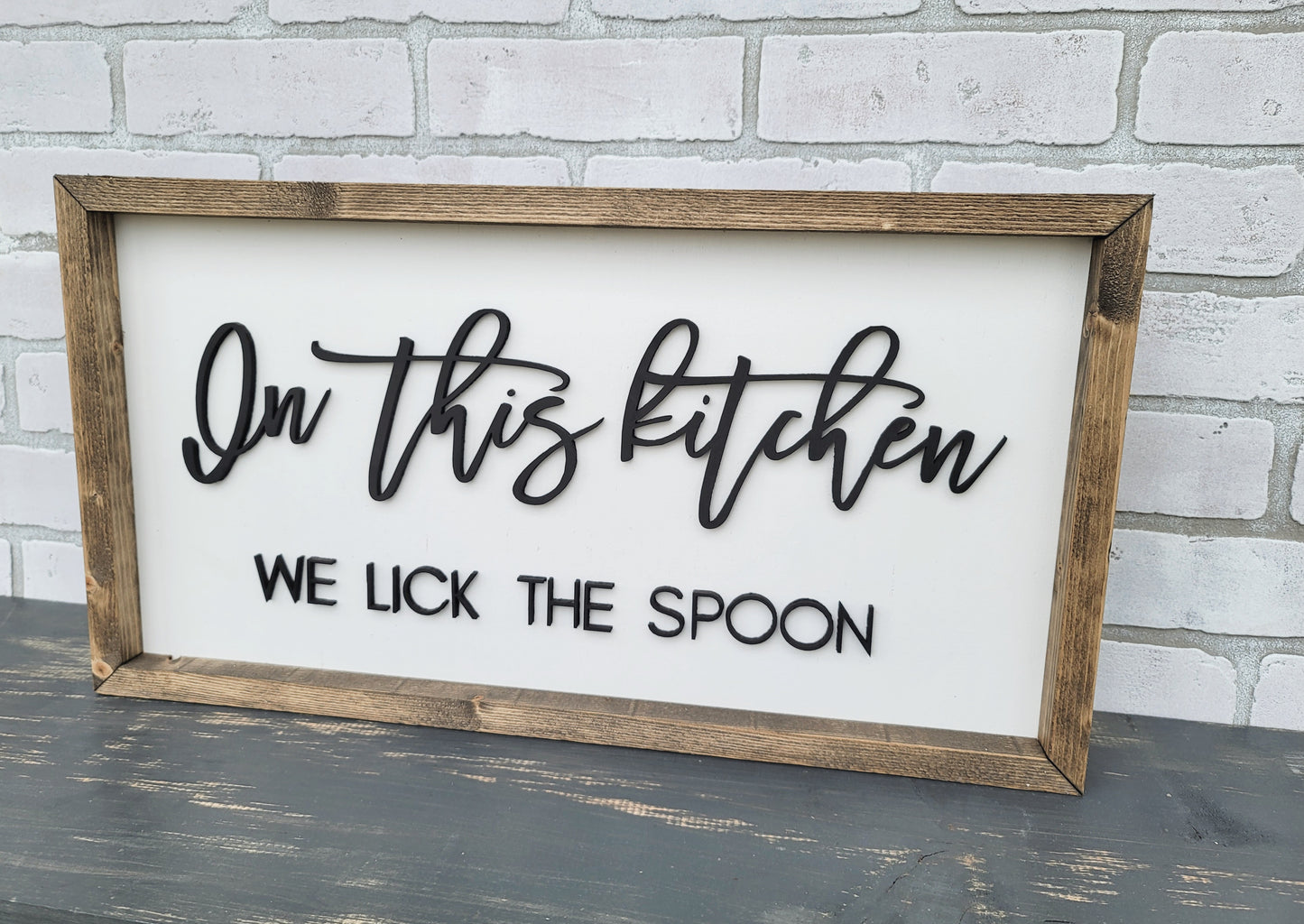 In This Kitchen We Lick The Spoon