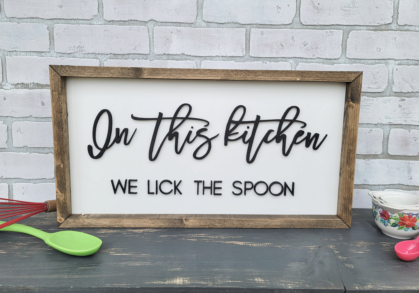 In This Kitchen We Lick The Spoon