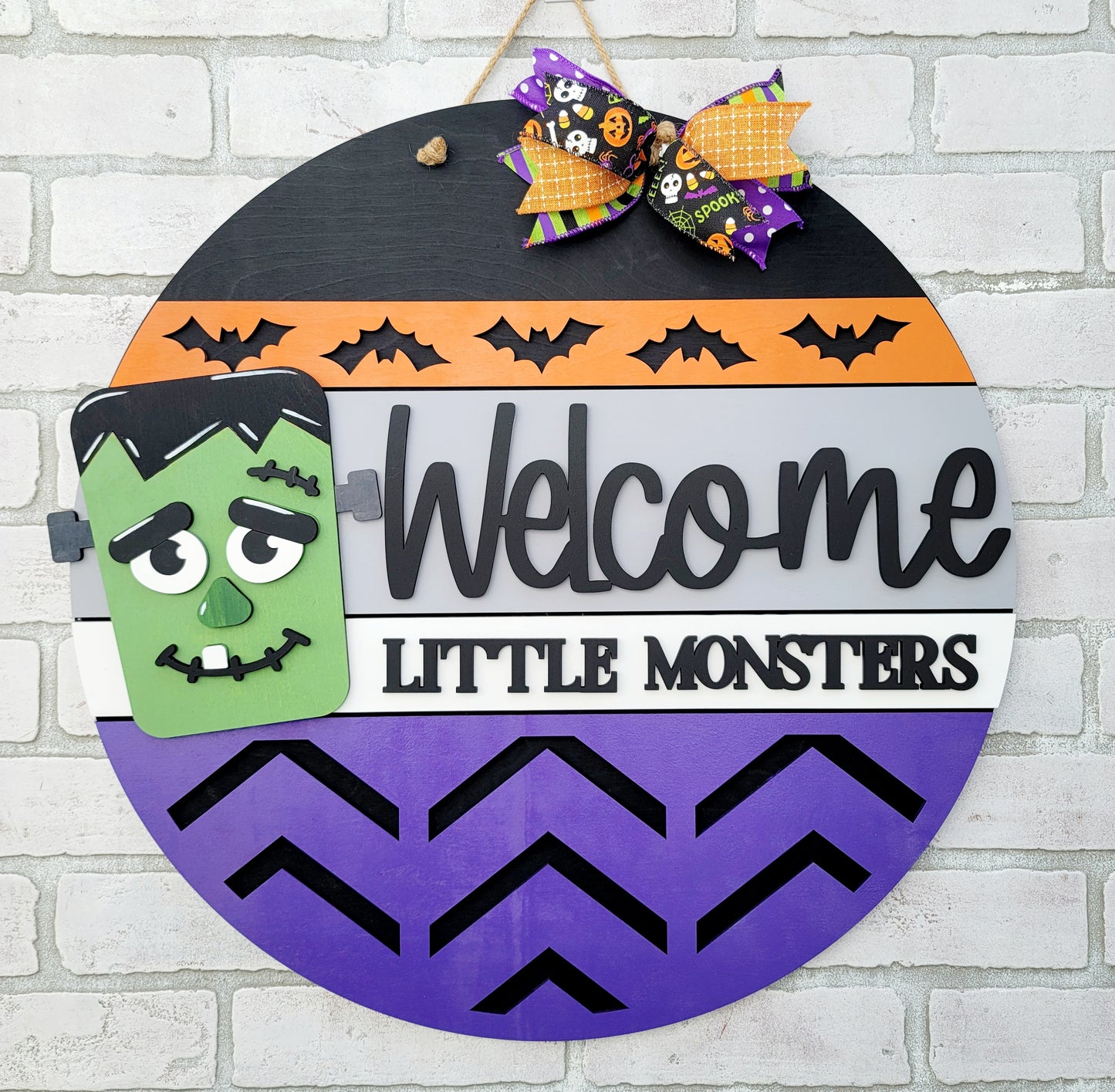 Welcome Little Monsters Door Hanger