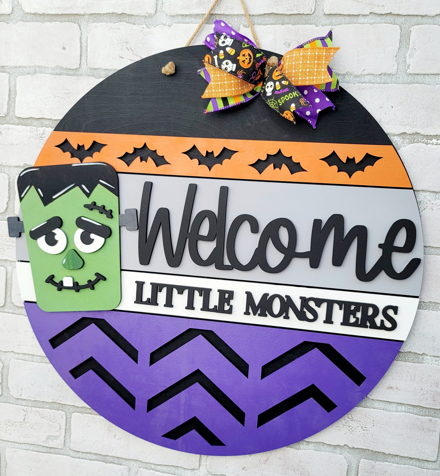 Welcome Little Monsters Door Hanger