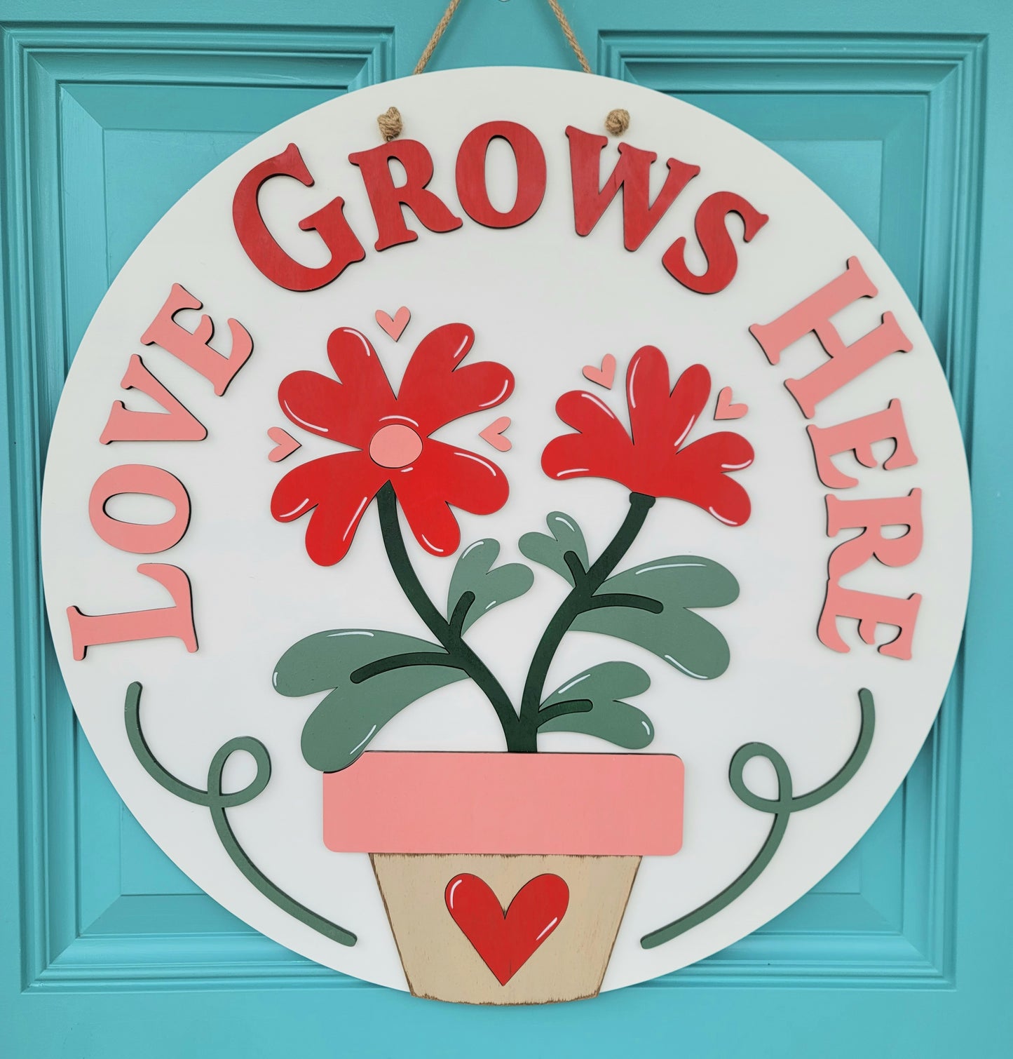 Love Grows Here Door Hanger