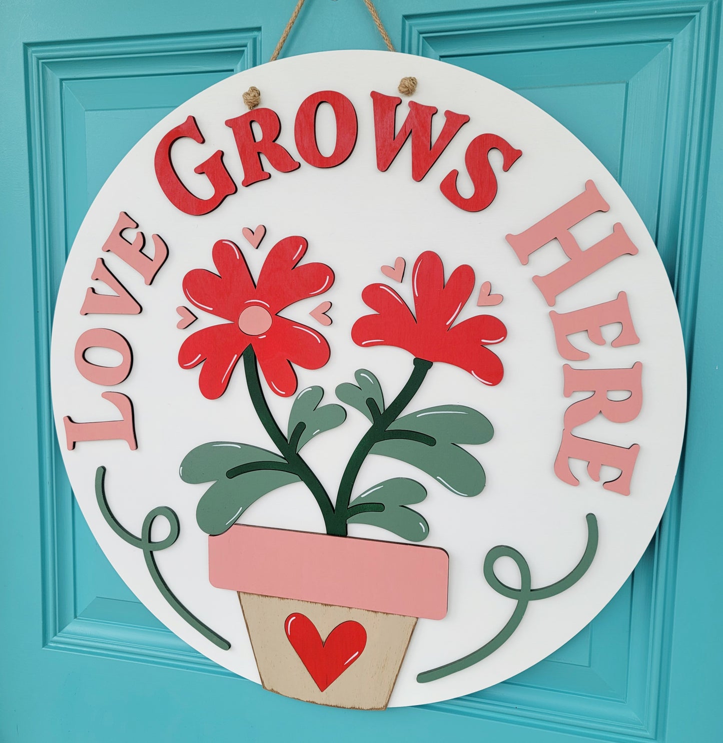 Love Grows Here Door Hanger