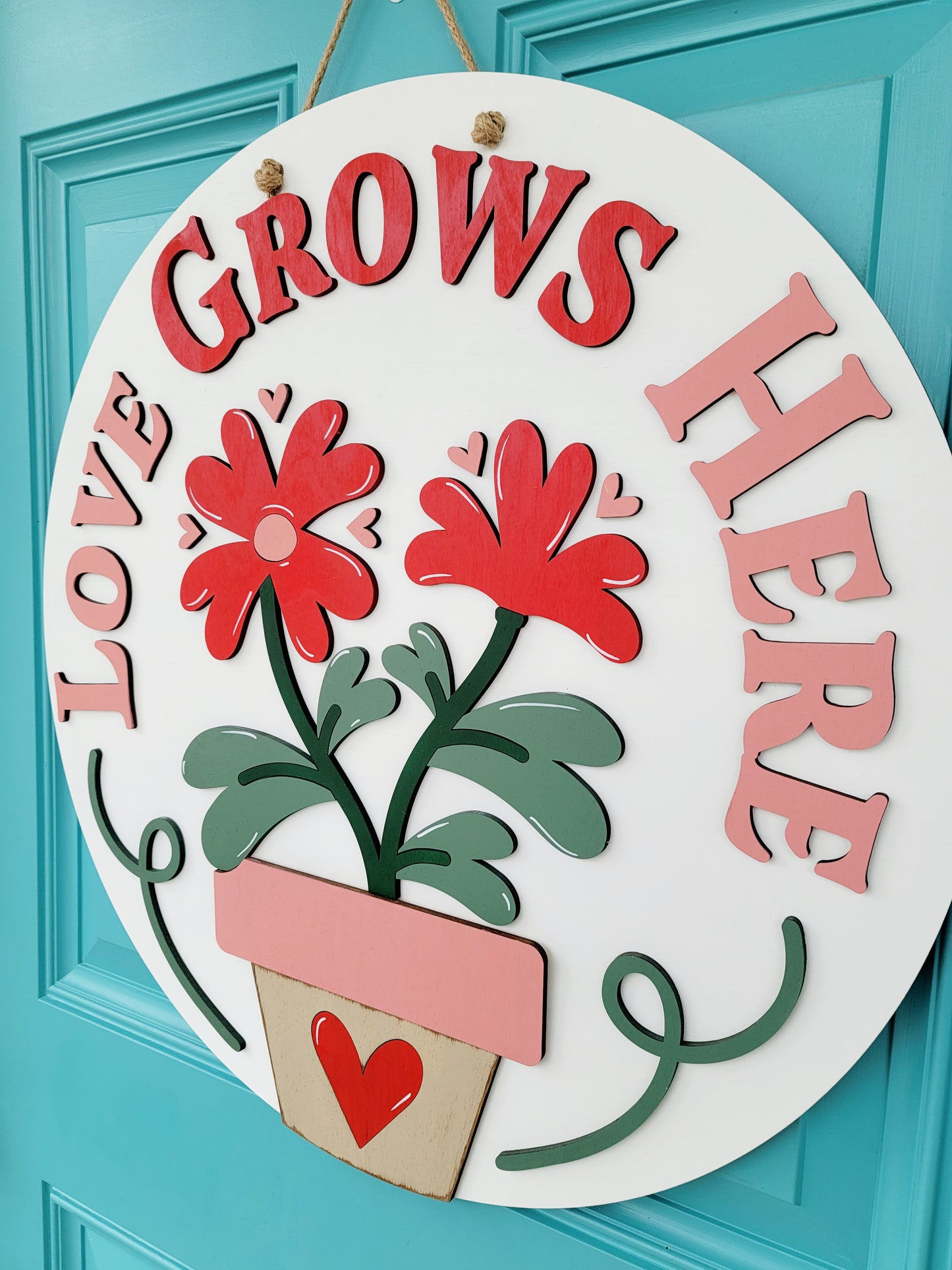 Love Grows Here Door Hanger