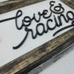 This house runs on Love & Racing Sign