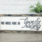 This house runs on Love & Racing Sign