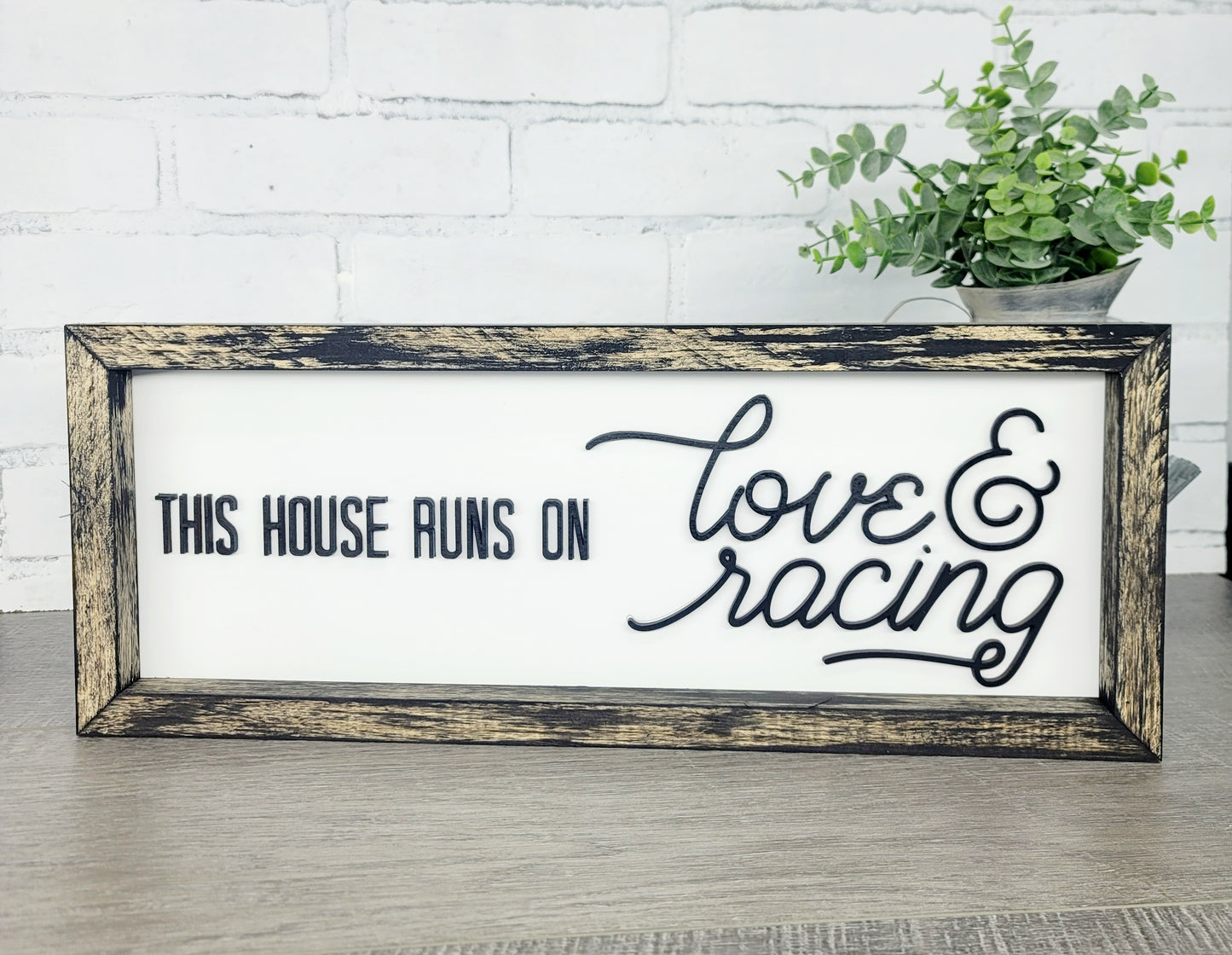 This house runs on Love & Racing Sign